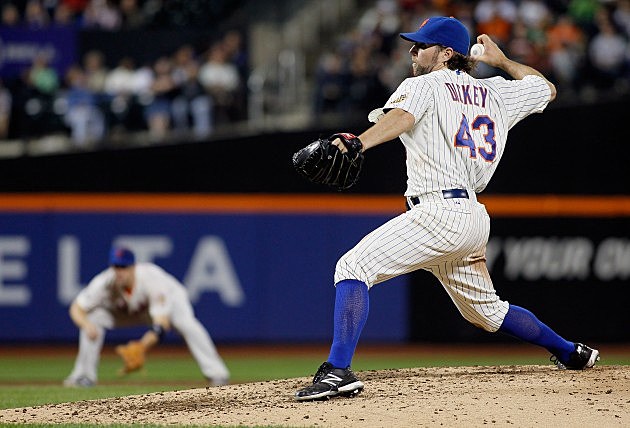 NEW YORK, NY - JUNE 18: R.A. Dickey #43 of the New York Mets delivers a pitch in the ninth-inning on his way to a complete game one hitter against the Baltimore Orioles at CitiField on June 18, 2012 in the Flushing neighborhood of the Queens borough of New York City. R.A. Dickey pitches a second consecutive one hitter, striking out career-high 13 batters, as the Mets defeated the Orioles 5-0. (Photo by Mike Stobe/Getty Images)