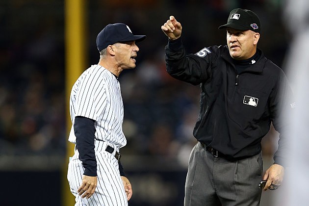 NEW YORK, NY - OCTOBER 14: Manager Joe Girardi of the New York Yankees is thrown out of the game by umpire Jeff Nelson out of the game in the eighth inning against the Detroit Tigers during Game Two of the American League Championship Series at Yankee Stadium on October 14, 2012 in the Bronx borough of New York City. (Photo by Elsa/Getty Images) NEW YORK, NY - OCTOBER 14: Manager Joe Girardi of the New York Yankees is thrown out of the game by umpire Jeff Nelson out of the game in the eighth inning against the Detroit Tigers during Game Two of the American League Championship Series at Yankee Stadium on October 14, 2012 in the Bronx borough of New York City. (Photo by Elsa/Getty Images)