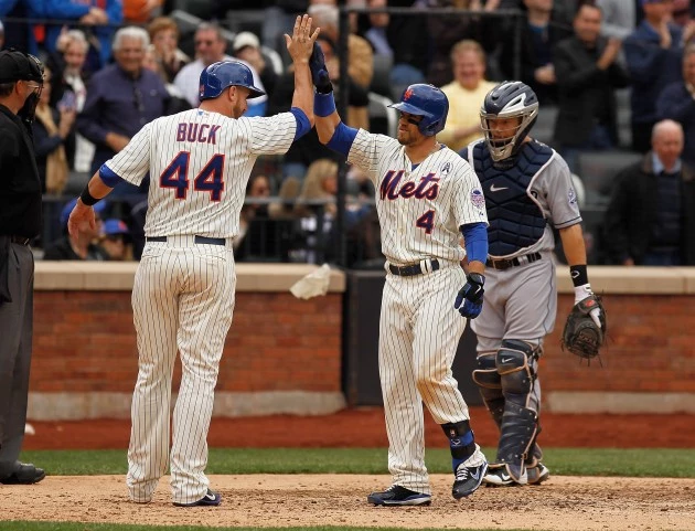 NEW YORK, NY - APRIL 01: Collin Cowgill #4 of the New York Mets is greeted by John Buck #44 after hitting a grand slam in the seventh inning against the San Diego Padres on opening day at Citi Field on April 1, 2013 in the Flushing neighborhood of the Queens borough of New York City. (Photo by Mike Stobe/Getty Images) NEW YORK, NY - APRIL 01: Collin Cowgill #4 of the New York Mets is greeted by John Buck #44 after hitting a grand slam in the seventh inning against the San Diego Padres on opening day at Citi Field on April 1, 2013 in the Flushing neighborhood of the Queens borough of New York City. (Photo by Mike Stobe/Getty Images)
