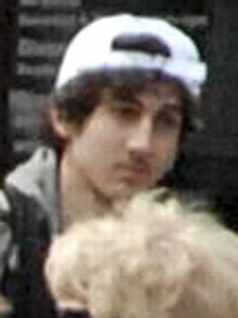 BOSTON, MA - APRIL 15: In this image released by the Federal Bureau of Investigation (FBI) on April 19, 2013, a suspect in the Boston Marathon bombing walks near the marathon finish line on April 15, 2013 in Boston, Massachusetts. The twin bombings at the 116-year-old Boston race resulted in the deaths of three people with more than 170 others injured. (Photo provided by FBI via Getty Images) BOSTON, MA - APRIL 15: In this image released by the Federal Bureau of Investigation (FBI) on April 19, 2013, a suspect in the Boston Marathon bombing walks near the marathon finish line on April 15, 2013 in Boston, Massachusetts. The twin bombings at the 116-year-old Boston race resulted in the deaths of three people with more than 170 others injured. (Photo provided by FBI via Getty Images)