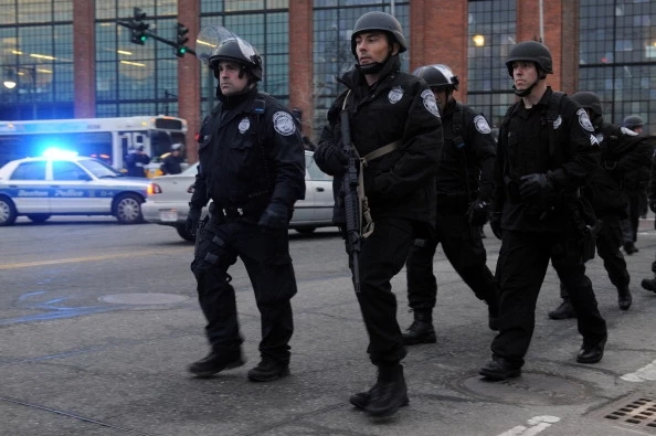 Police in Watertown outside school 04192013 by Darren McCollester, Getty Images