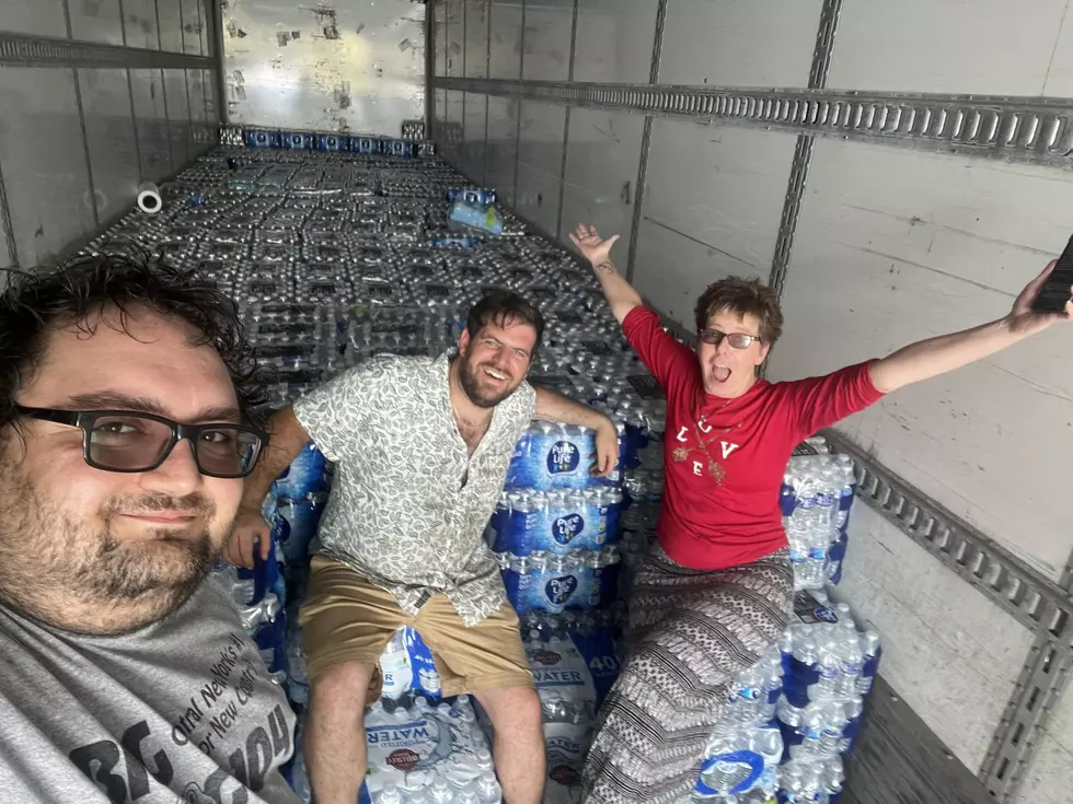 Central New York Rallies for Rome, Stuffs 18-Wheeler Full of Bottled Water